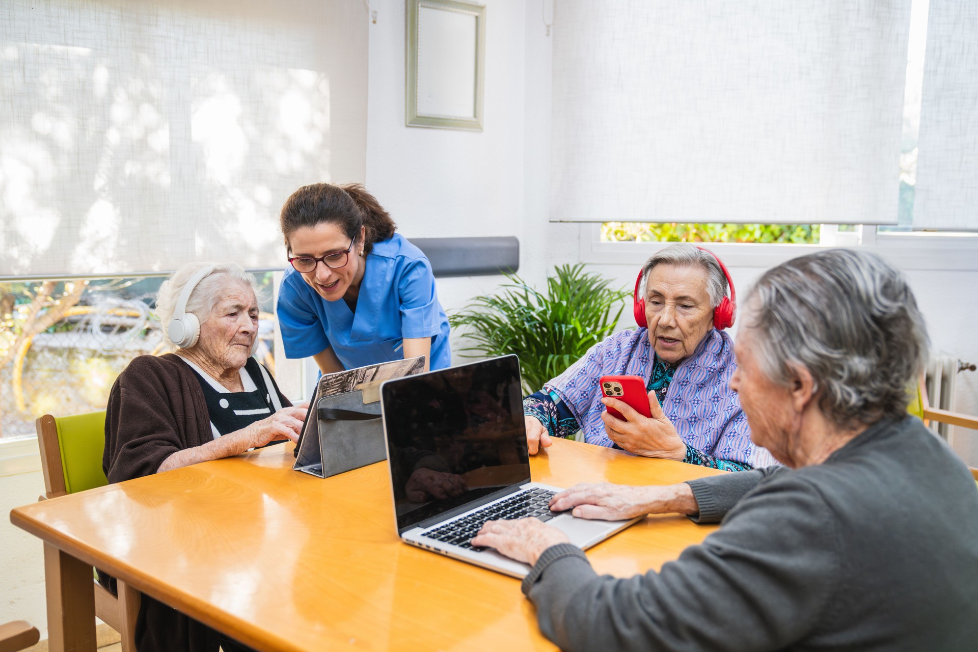 Seniors engaging with technology in nursing home